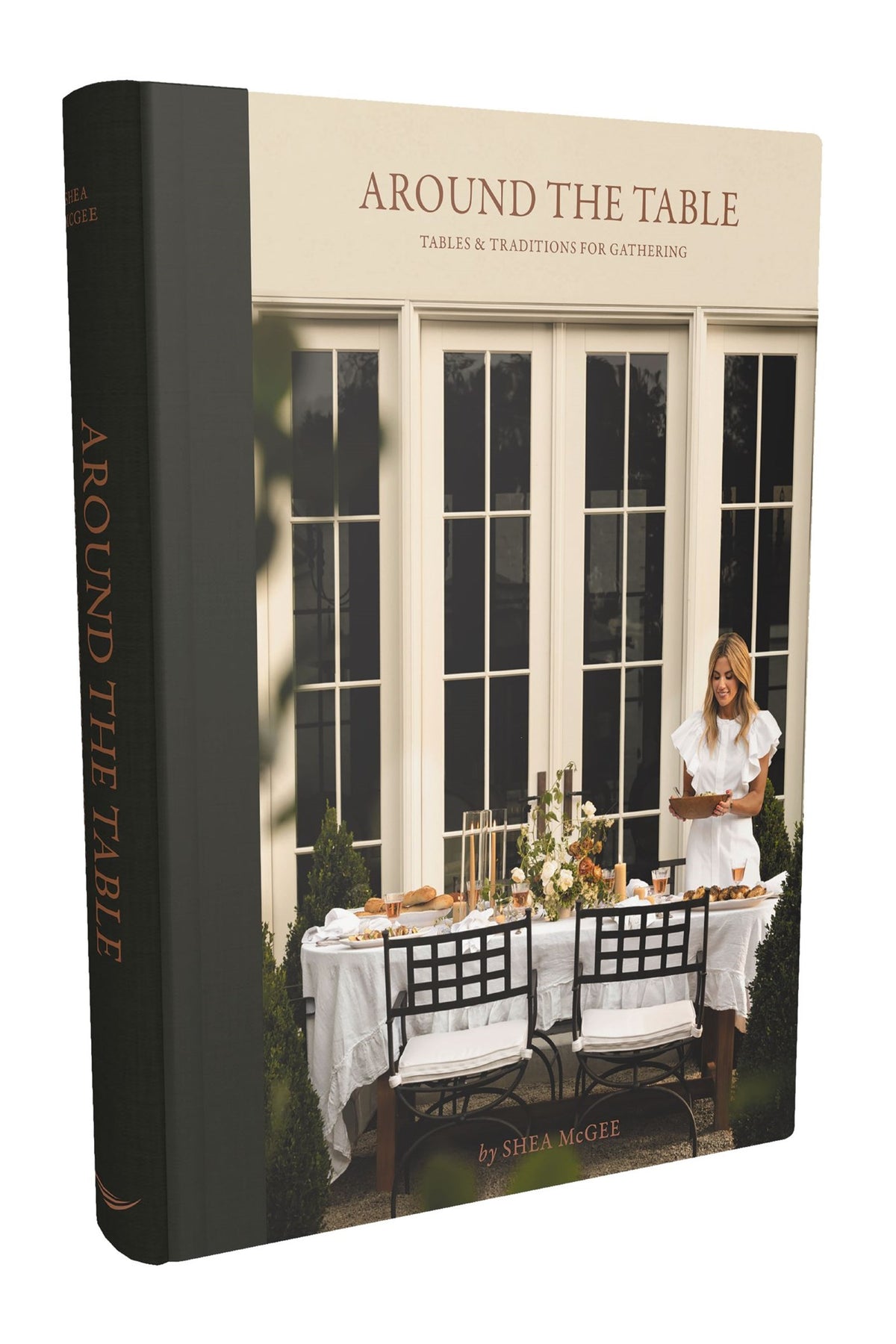 Around the Table hardcover book with a cream cover featuring a woman setting an outdoor dining table.