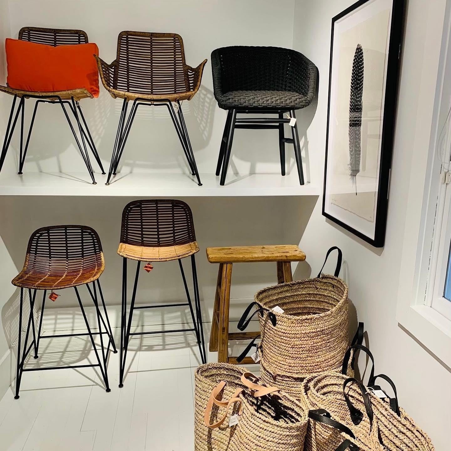 Charly Black Rope Dining Arm Chair: Woven PE resin wicker armchair with matte black aluminum frame.