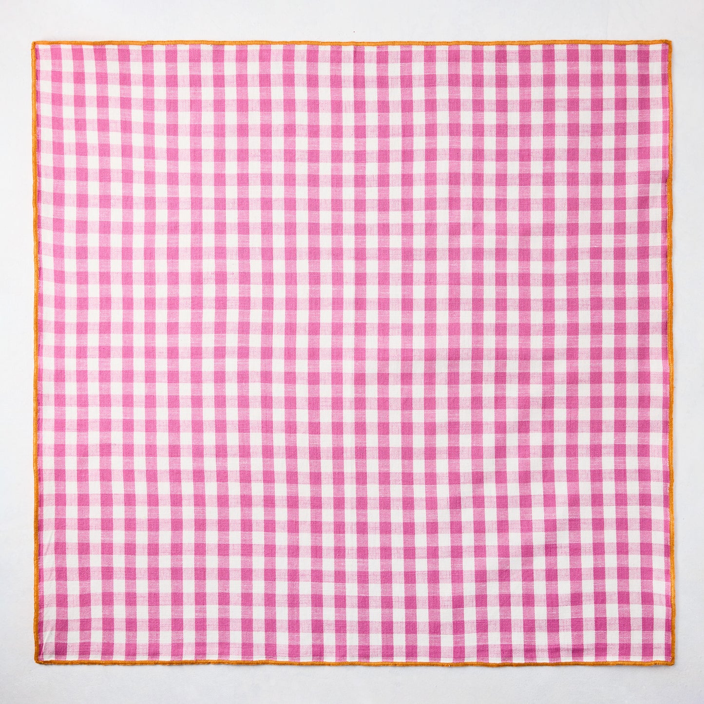 Chatham Pink Gingham Cotton Napkin with Orange Trim, 22" square.