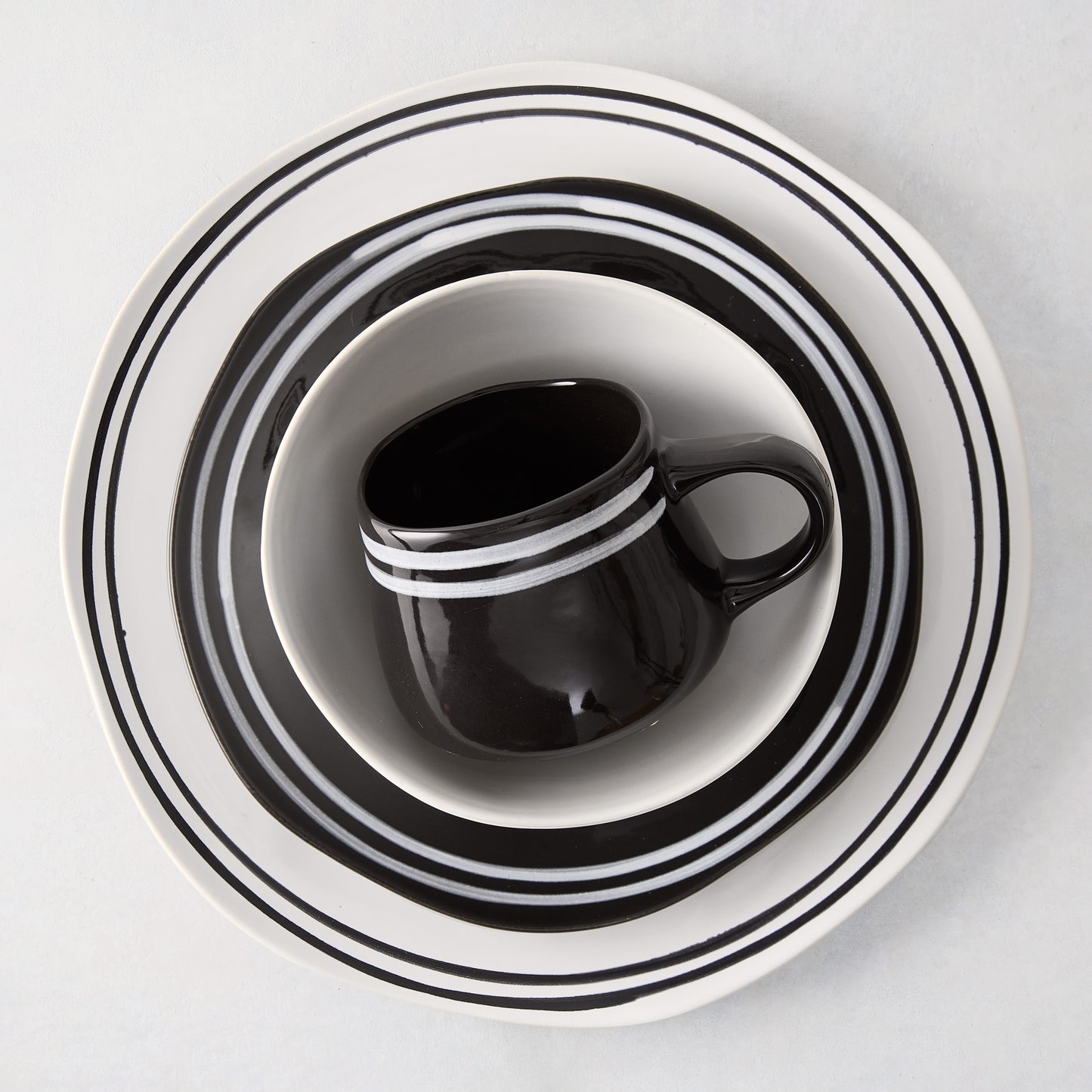 Diane Keaton + Hudson Grace Draft Collection black and white stoneware dinnerware set with double stripes.