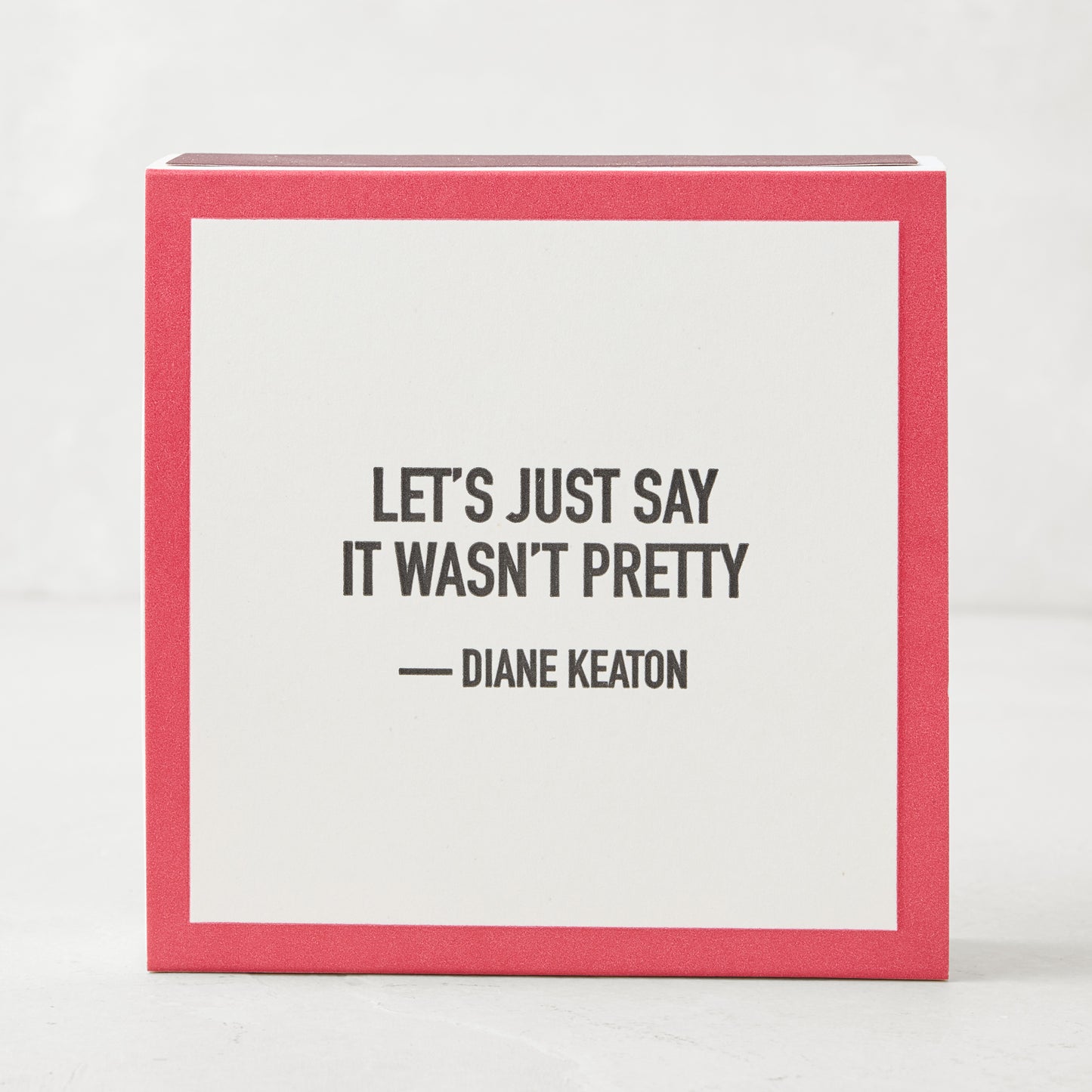 Diane Keaton + Hudson Grace "It Wasn't Pretty" oversized boxed matches, red and white with black text.