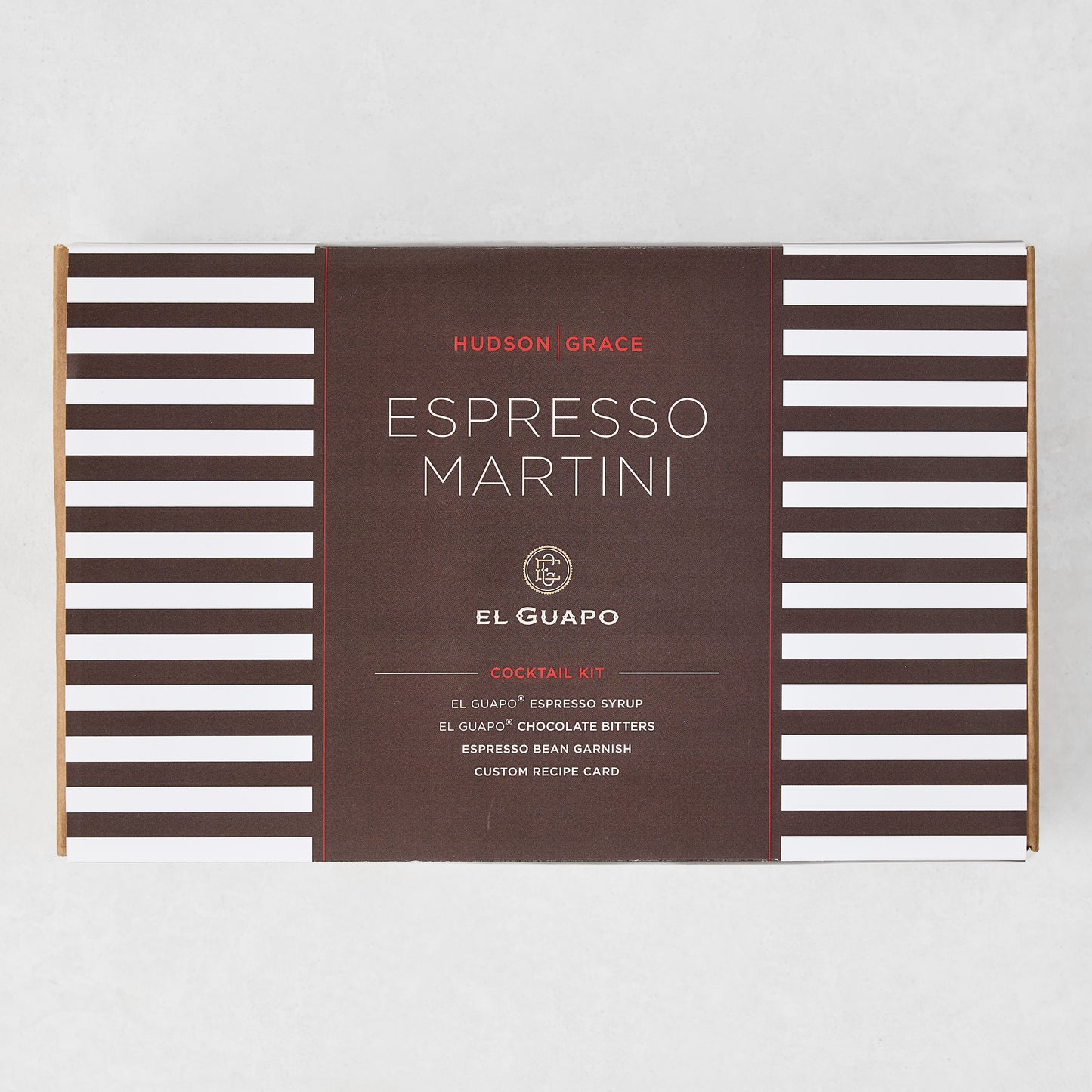 El Guapo Espresso Martini Cocktail Kit in a white and brown striped gift box with a dark brown label.