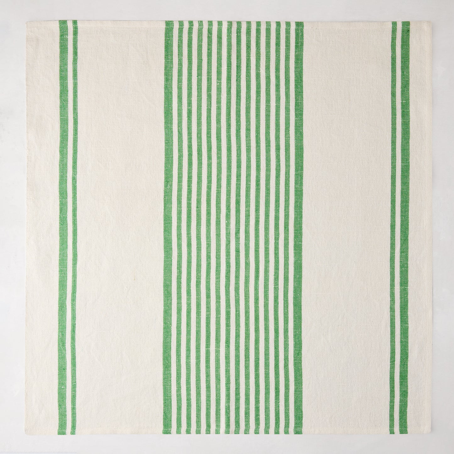 Green Boat Stripe Napkin, 22" square, washed cotton-linen blend, with vertical green stripes on cream.