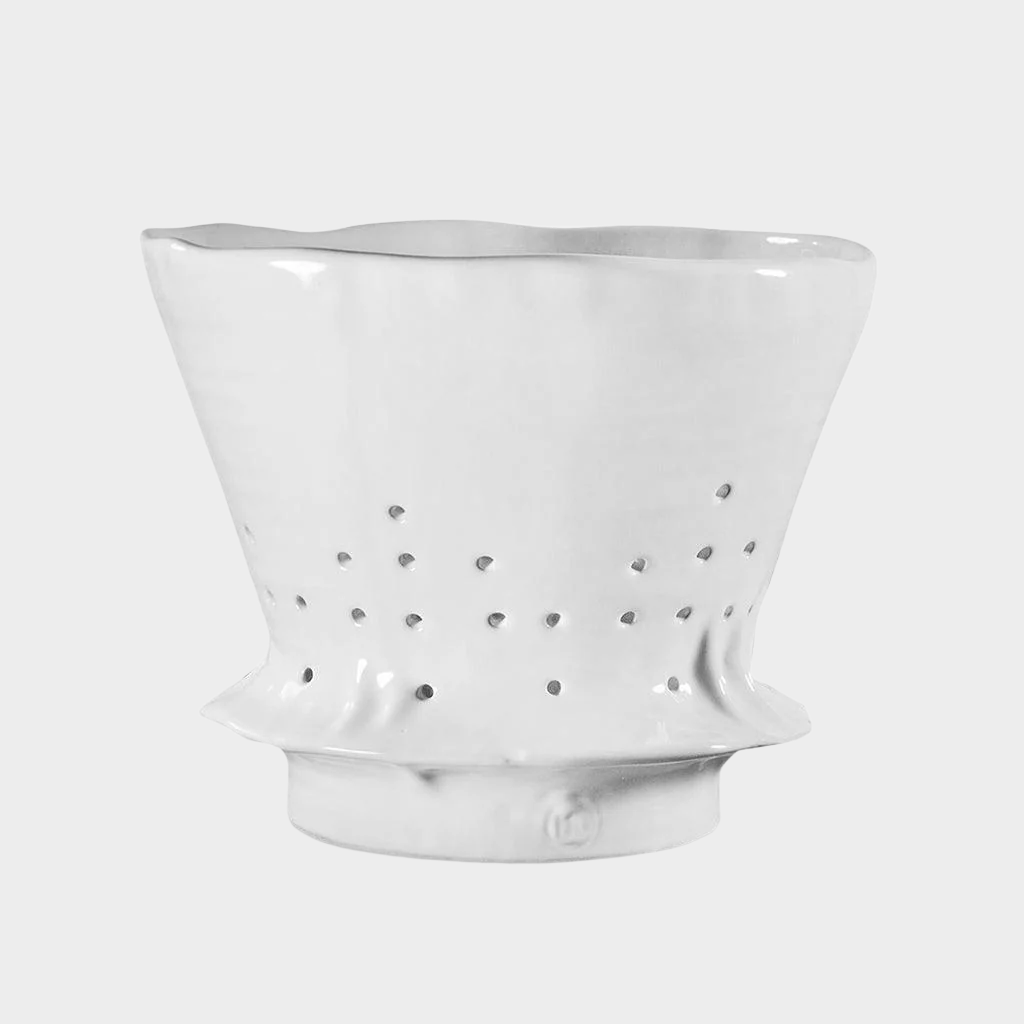 Handmade creamy white ceramic colander by Montes Doggett, 9.5"Dia x 7.5"H, with drainage holes.