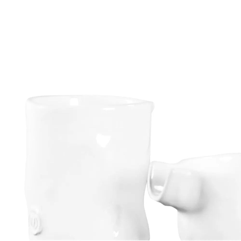 Set of 3 handmade Montes Doggett ceramic tumblers in creamy white glaze, varying sizes.