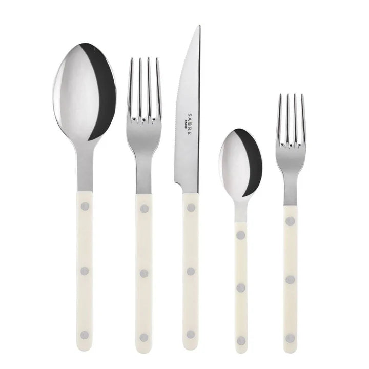 Ivory Bistro 5-piece flatware set with stainless steel and cream acrylic handles.