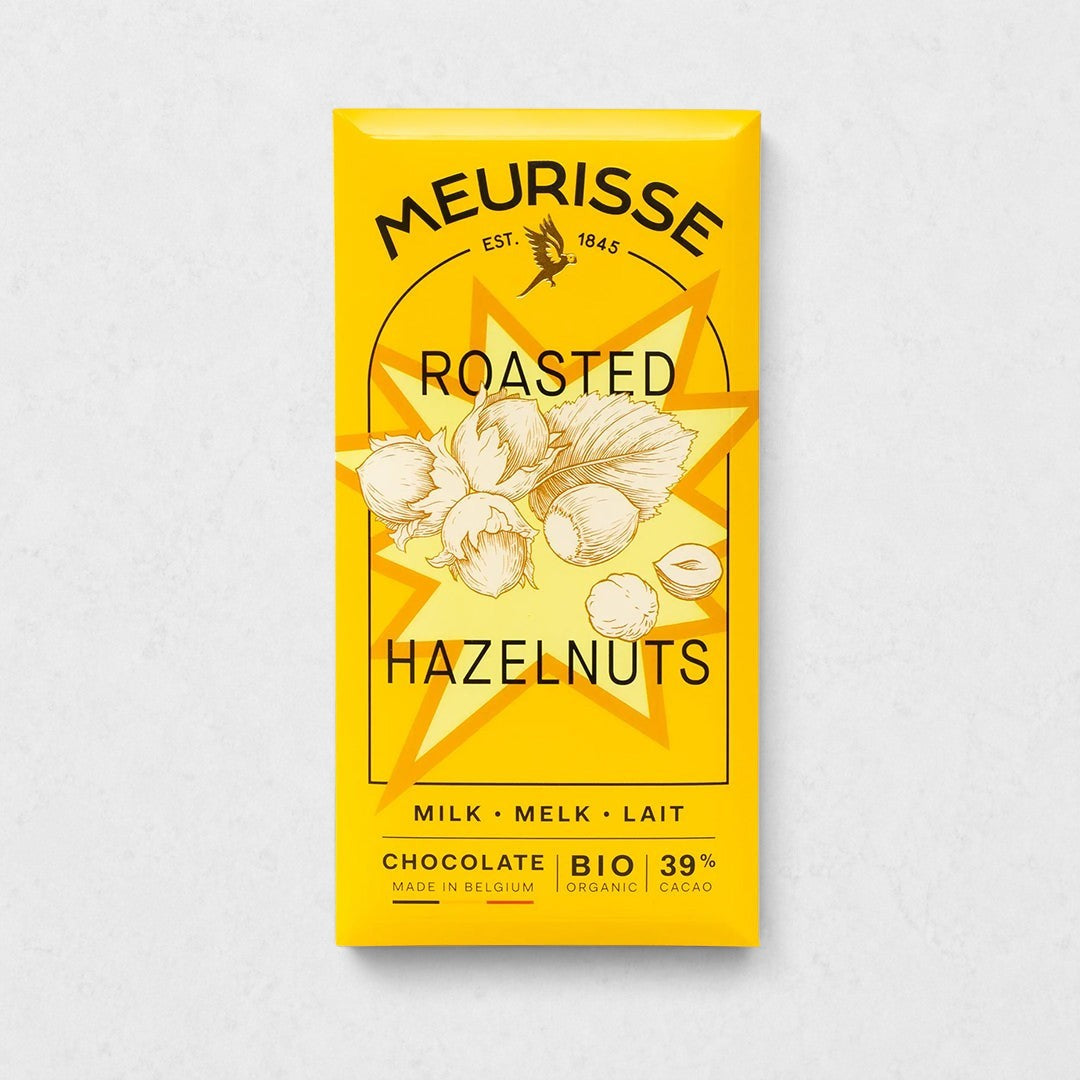 Meurisse Roasted Hazelnuts Milk Chocolate bar in bright yellow packaging with hazelnut illustration.