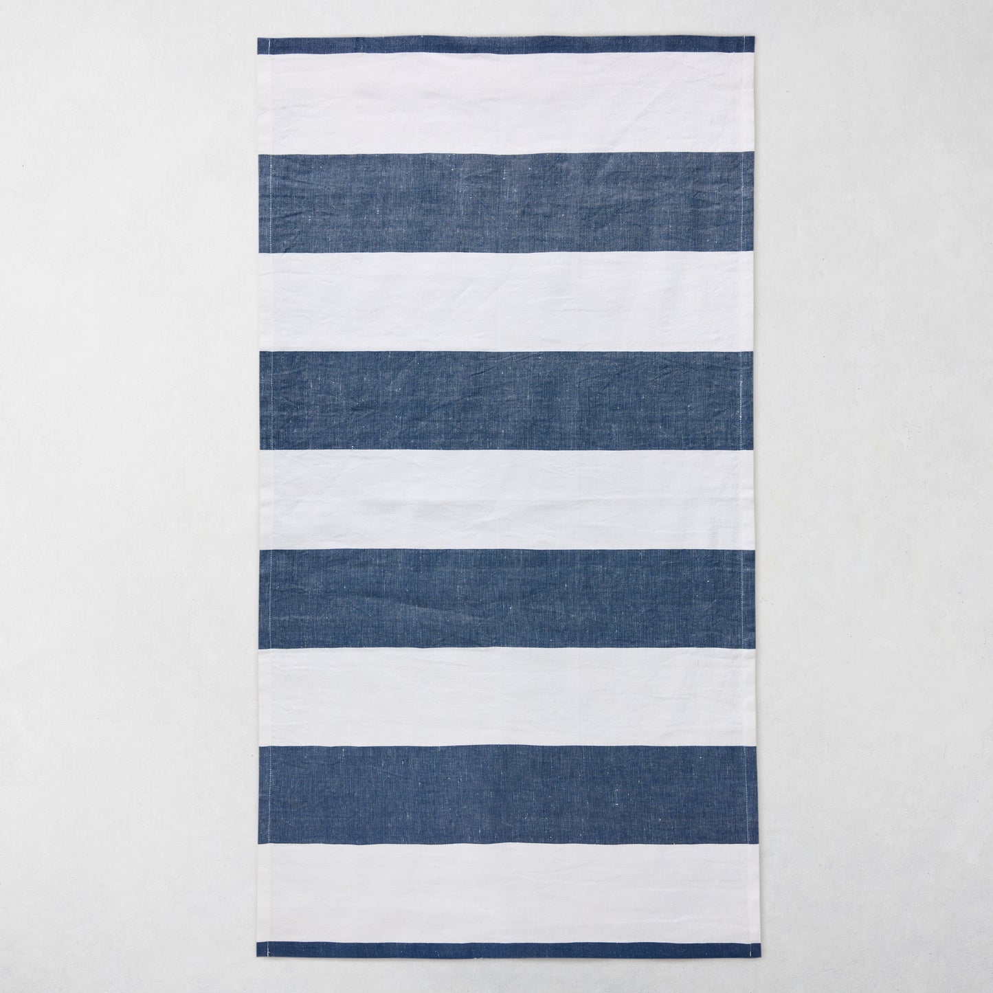 Navy and white striped cotton-linen hand towel, 20"W x 30"L.