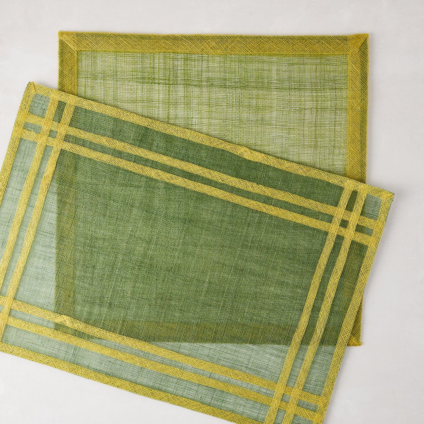 Newport Green Rectangular Abaca Placemat with yellow border, 19"L x 13"W.