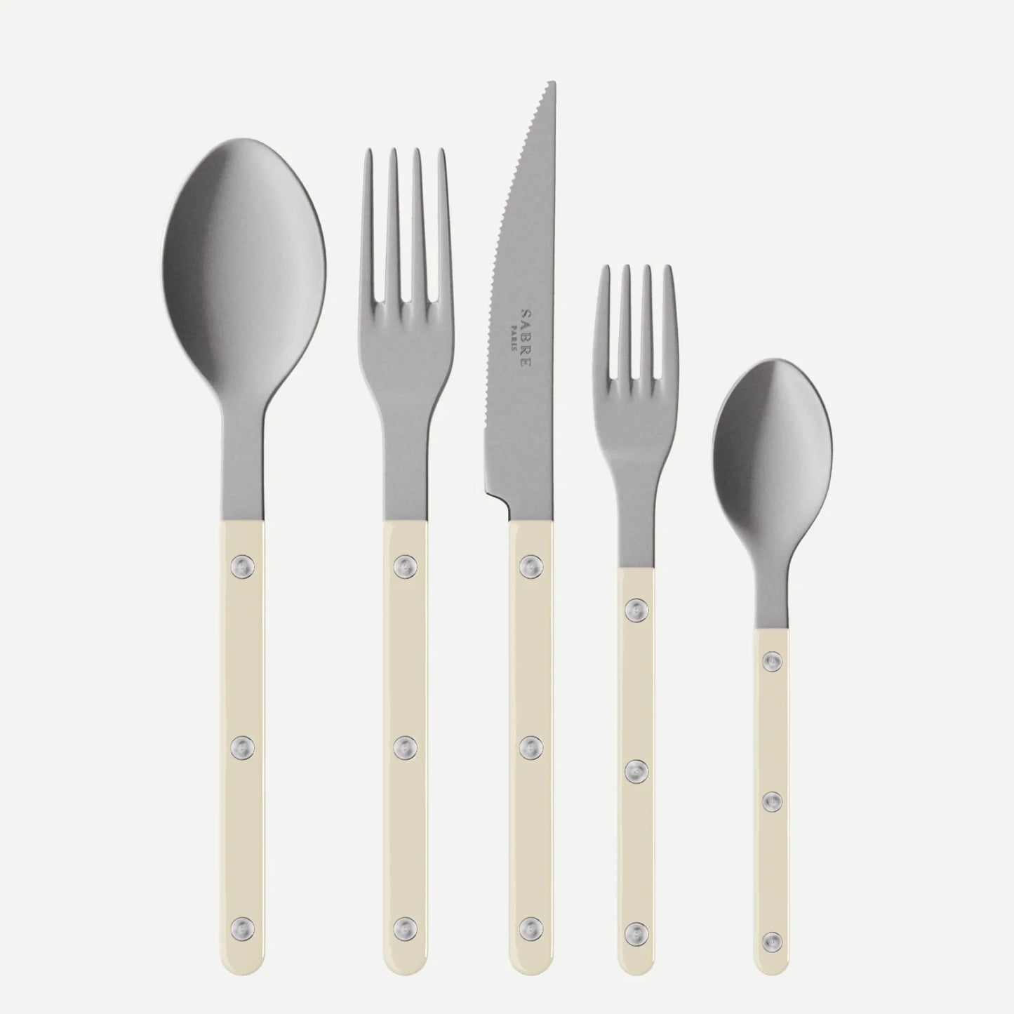 Paris Bistro Vintage Finish 5-piece flatware set with stainless steel and cream acrylic handles.