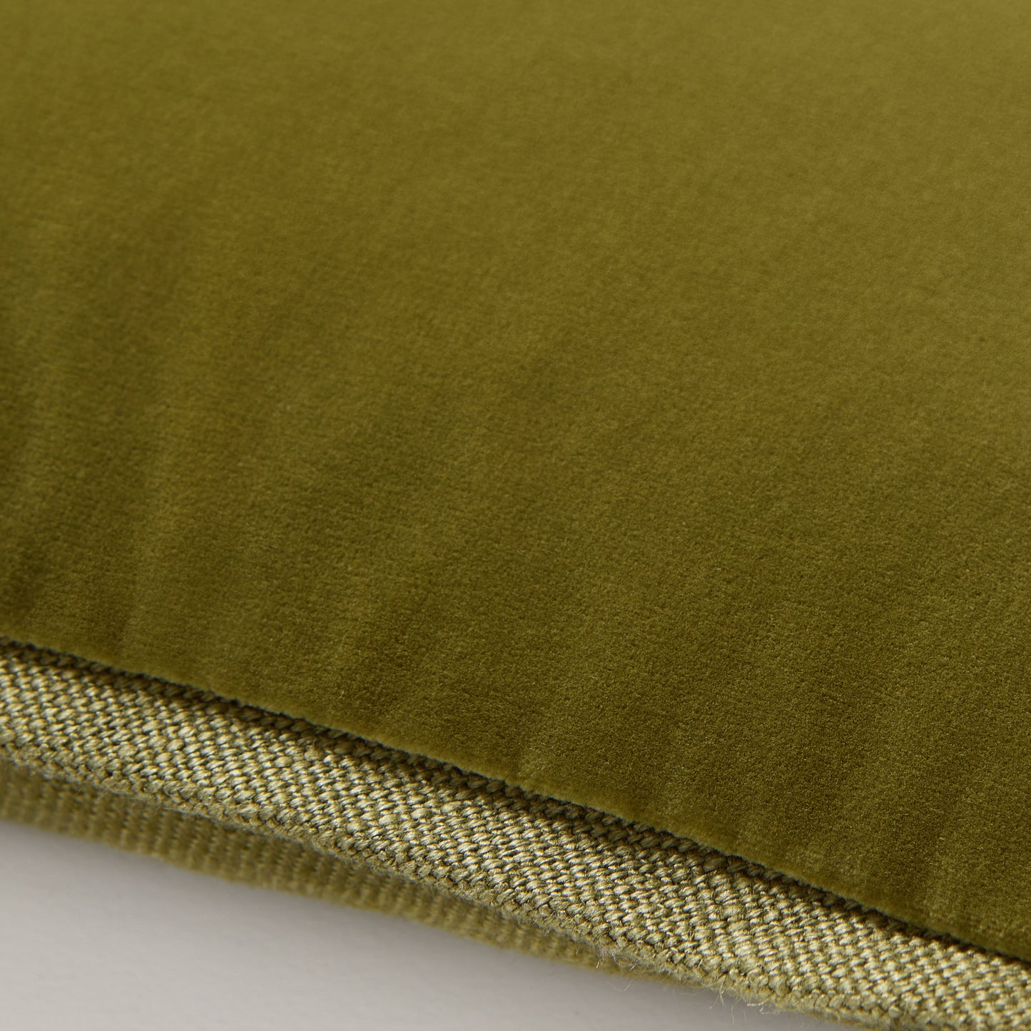 Pesto green tonal reversible velvet and linen lumbar pillow, 20"L x 14"H.