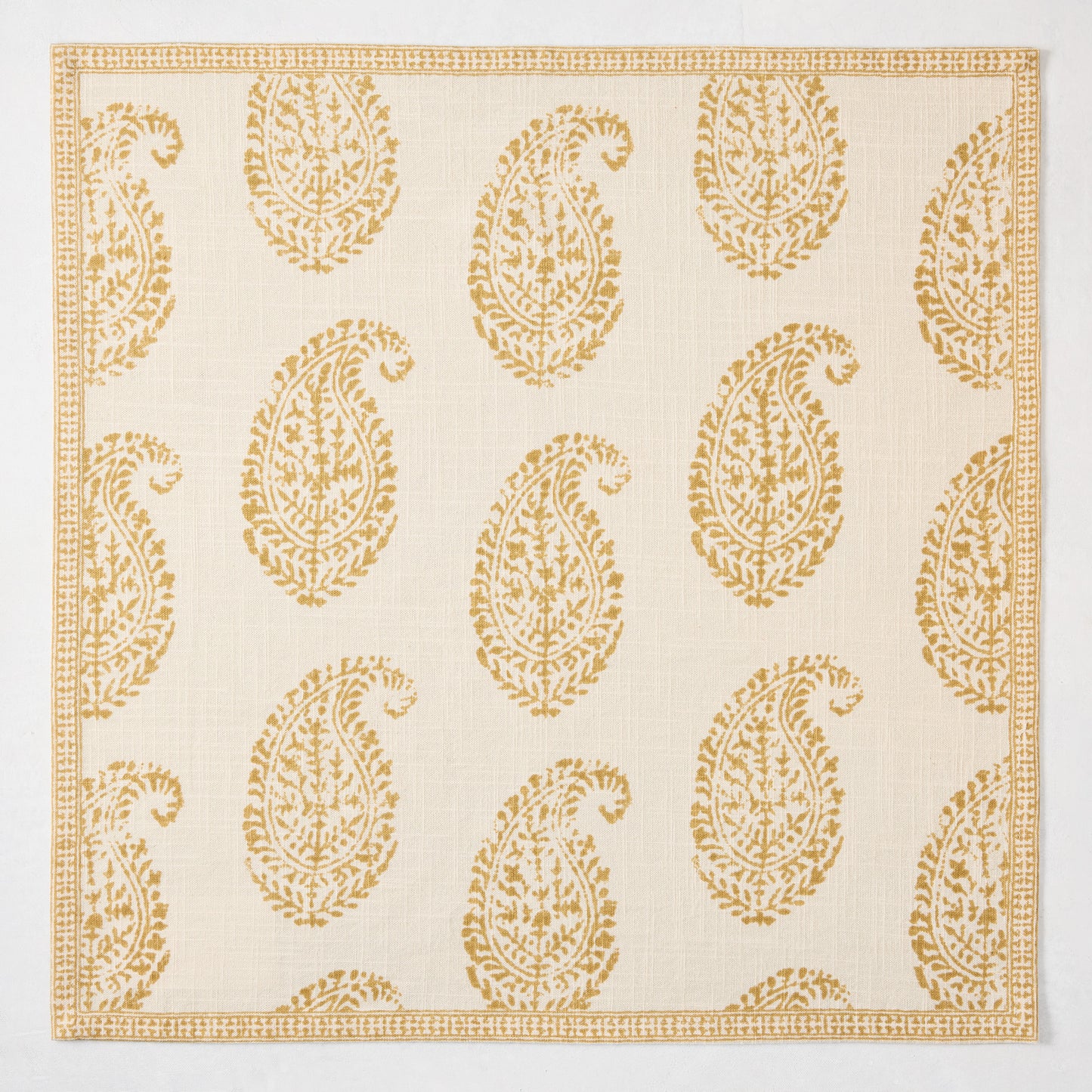 Peter Dunham + Hudson Grace Golden Yellow Kashmir Paisley Printed Napkin, ivory with gold motif.