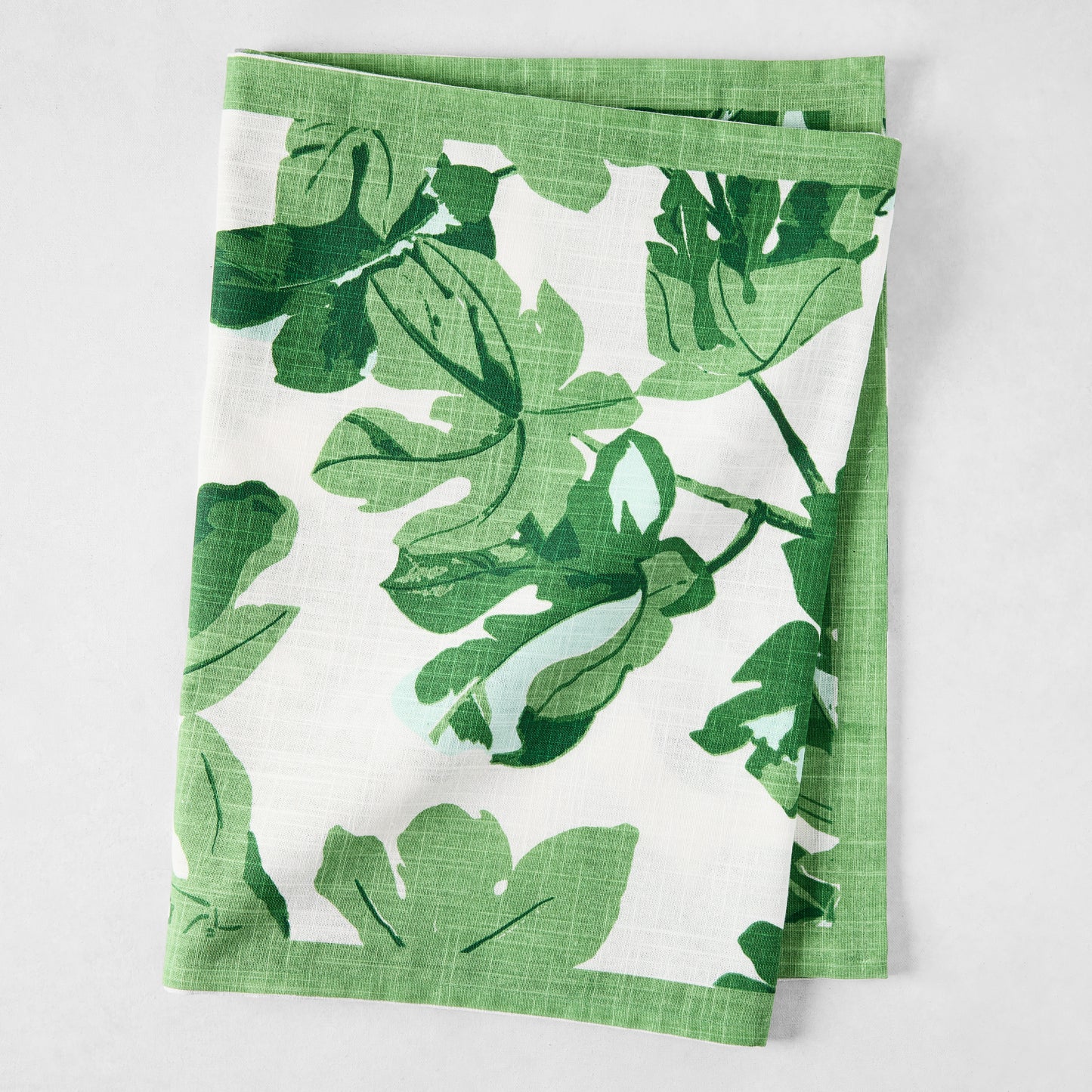 Peter Dunham + Hudson Grace Green Fig Leaf Printed White Runner, 100% cotton slub, folded.