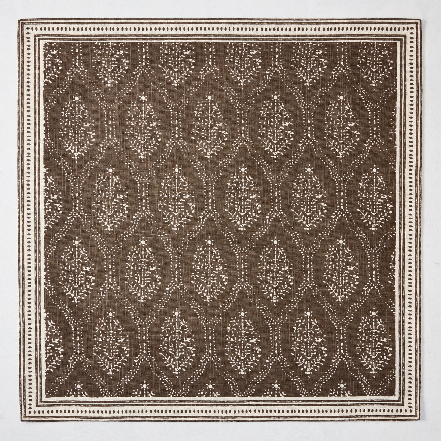 Peter Dunham + Hudson Grace Jaali Chocolate Brown Printed Napkin, 100% cotton slub with floral pattern and border.