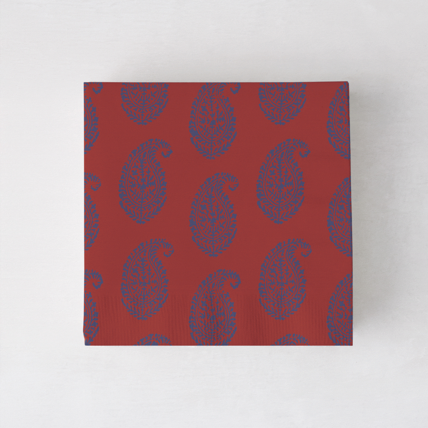 Peter Dunham + Hudson Grace Kashmir cocktail napkins, red with blue paisley pattern.