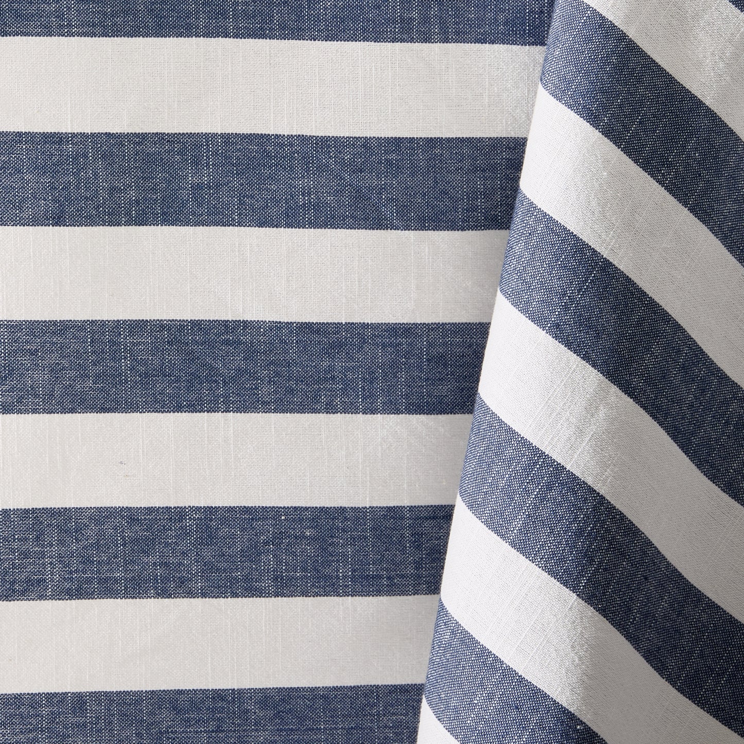 Rockport Navy Blue Stripe Cotton Tablecloth with Orange Trim, featuring white and navy stripes.