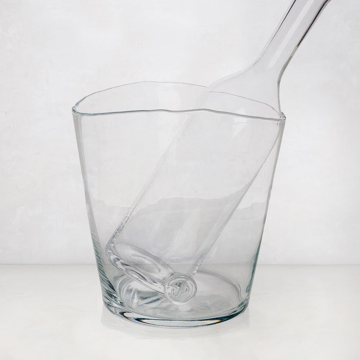 Clear mouth-blown glass Romeo Scissor-Cut Wine Carafe, 17.5"H, with a unique angled rim.