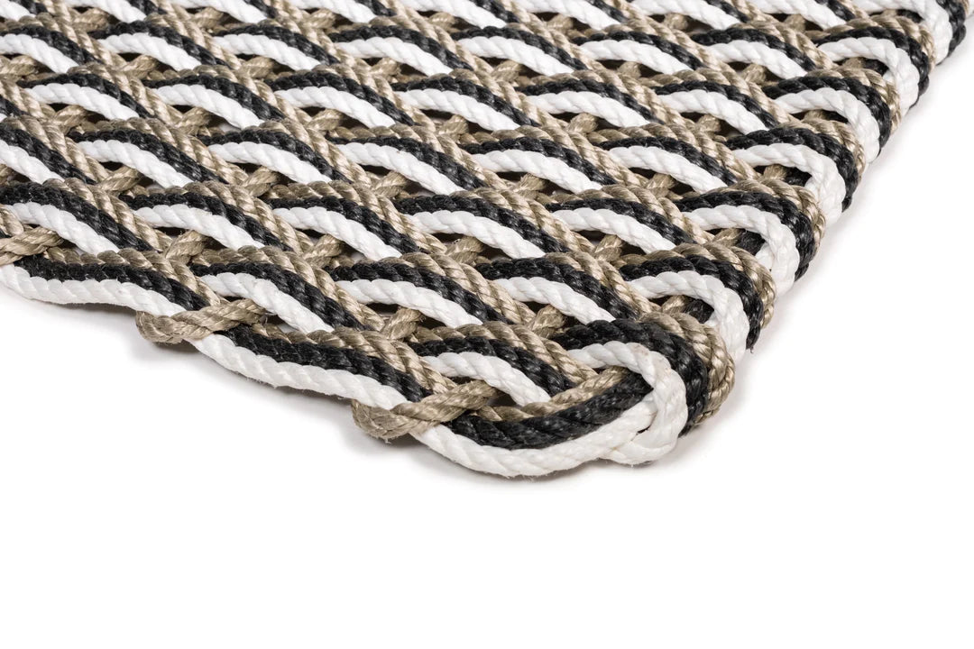 Handwoven Sand, Charcoal, Pearl Rope Doormat with braided pattern and rounded corner.