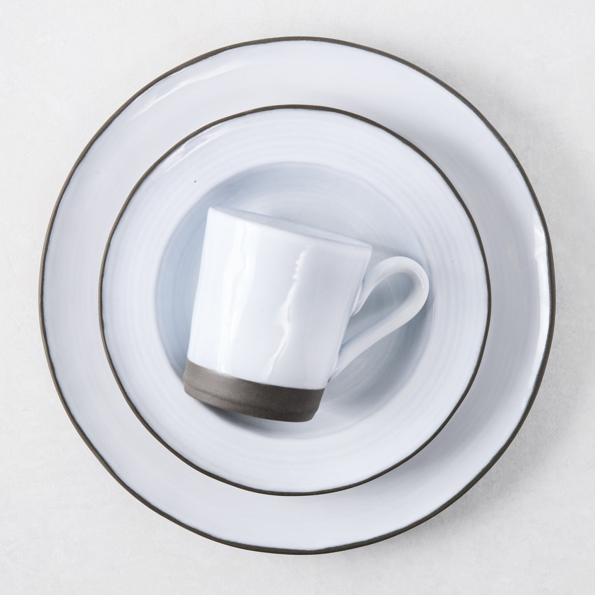 Smoke Grey Stoneware Salad Plate, 8.3"Dia, with a two-toned grey glaze and dark rim.