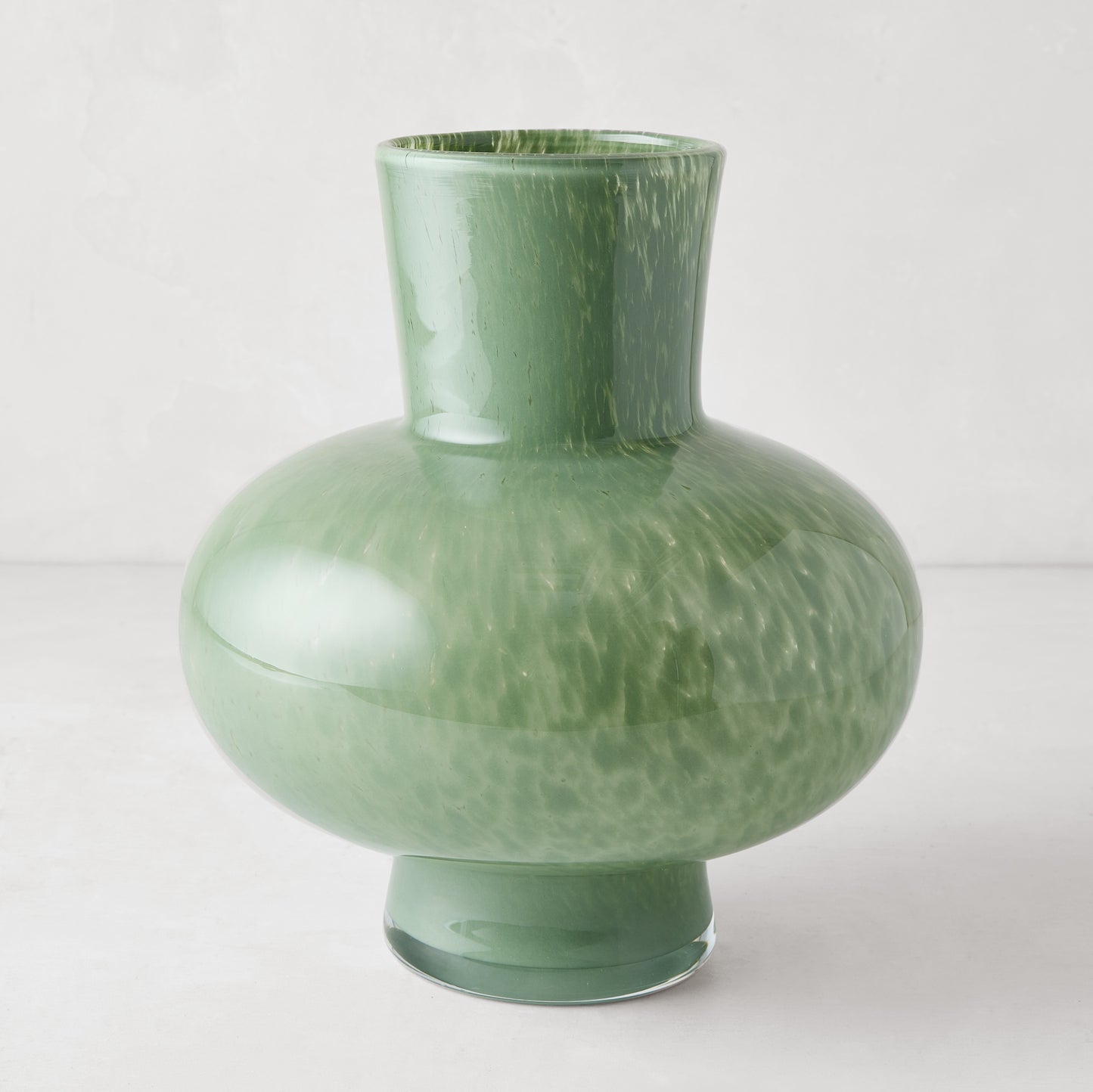 Oversized Sonia Green Glass Vase, handblown, with an opaque finish and unique speckled texture.