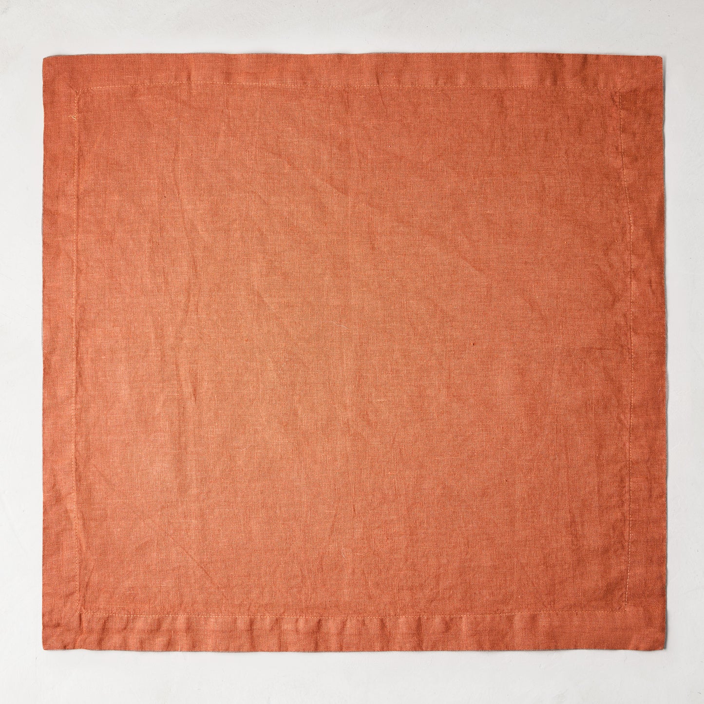 Spice HG Hand-Dyed Linen Napkin, 22" square, with mitered corners.