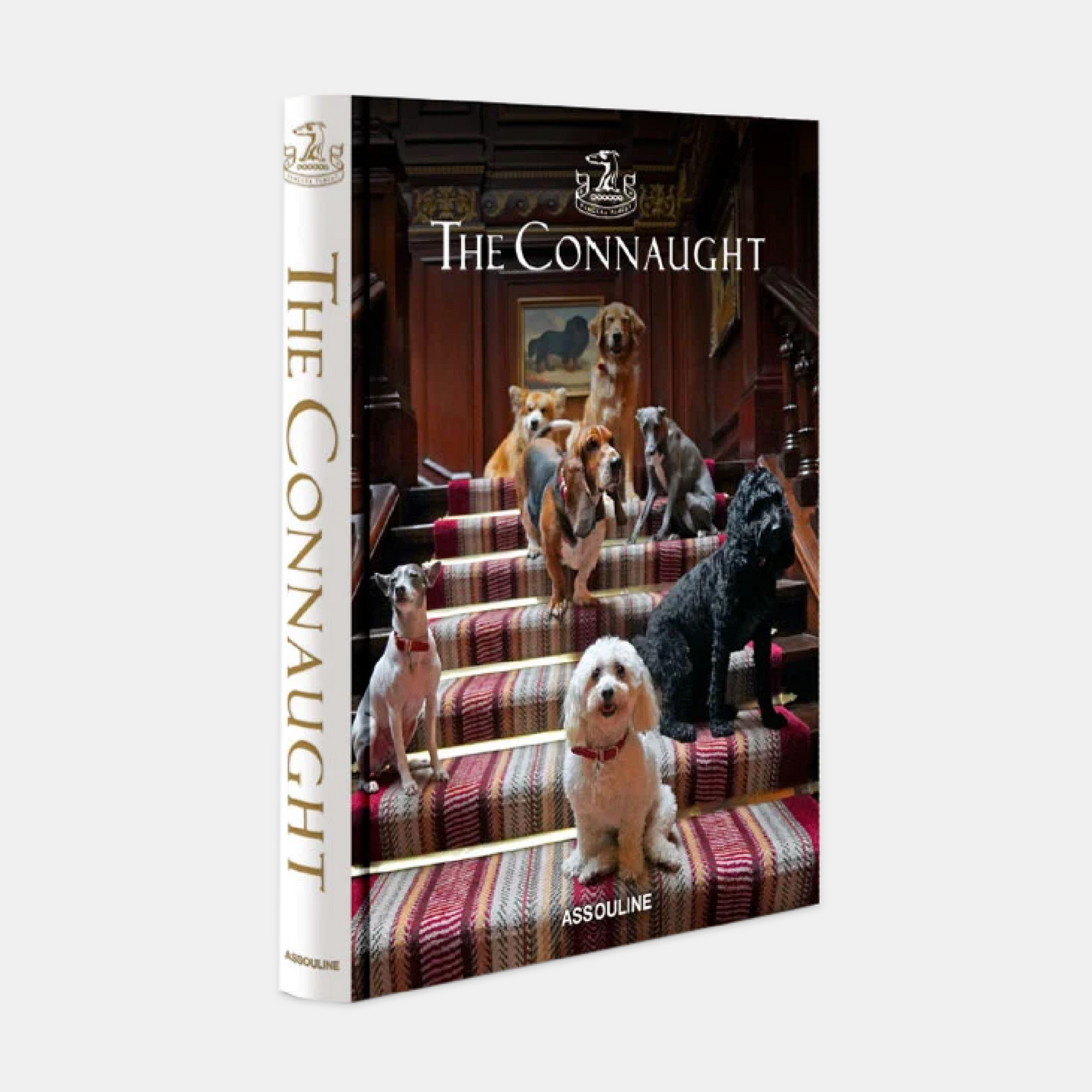 Hardcover "The Connaught" book by Assouline, featuring dogs on a grand staircase on the cover.