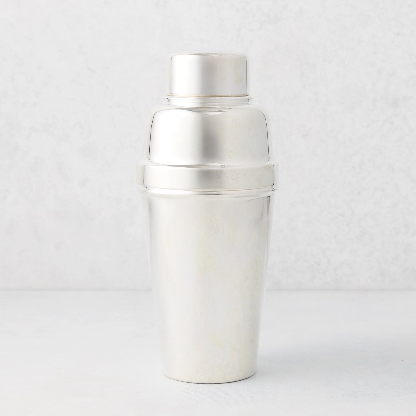 Vintage silverplate Carolina cocktail shaker with a polished finish.