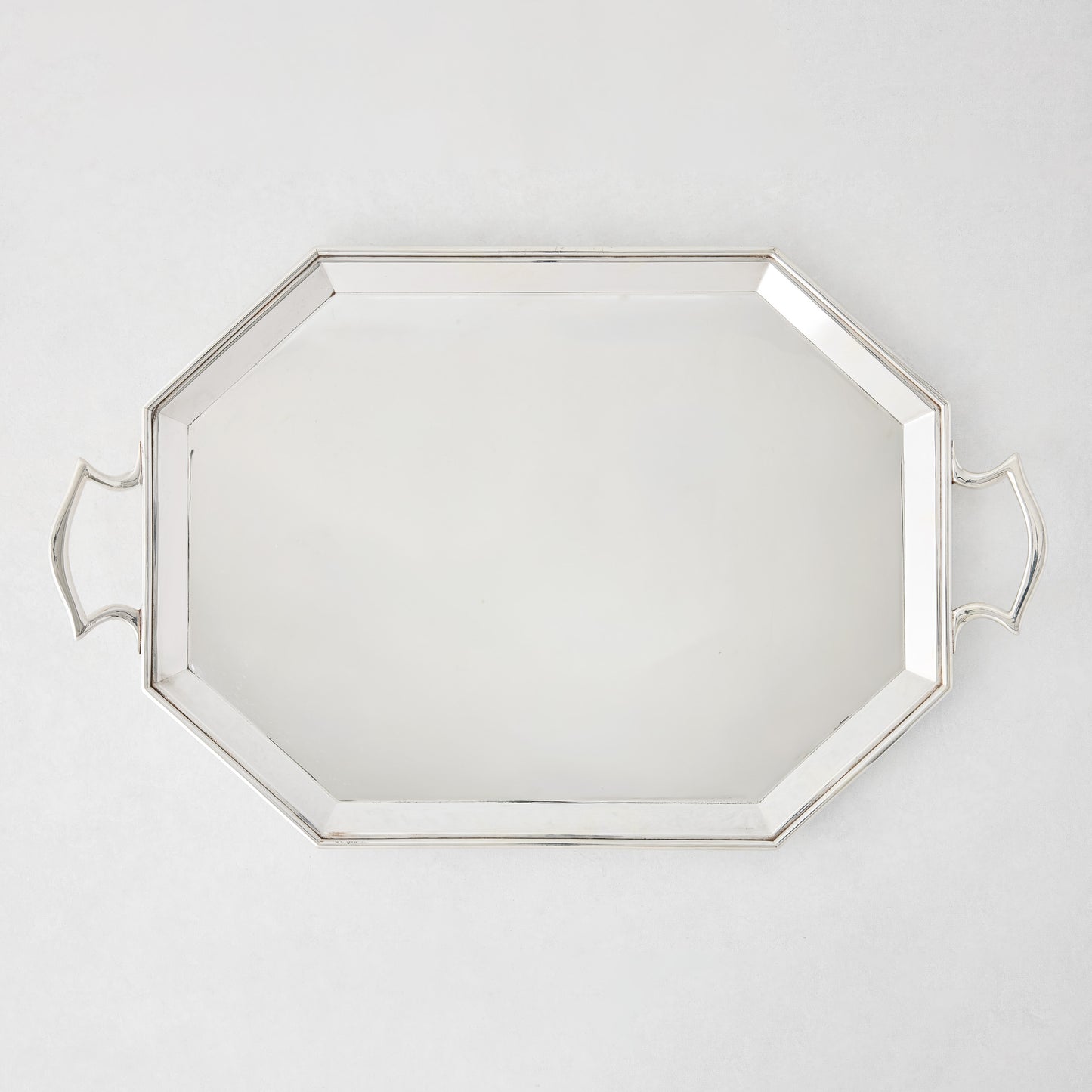 Vintage silverplate large Jake tray with an octagonal shape and two handles.