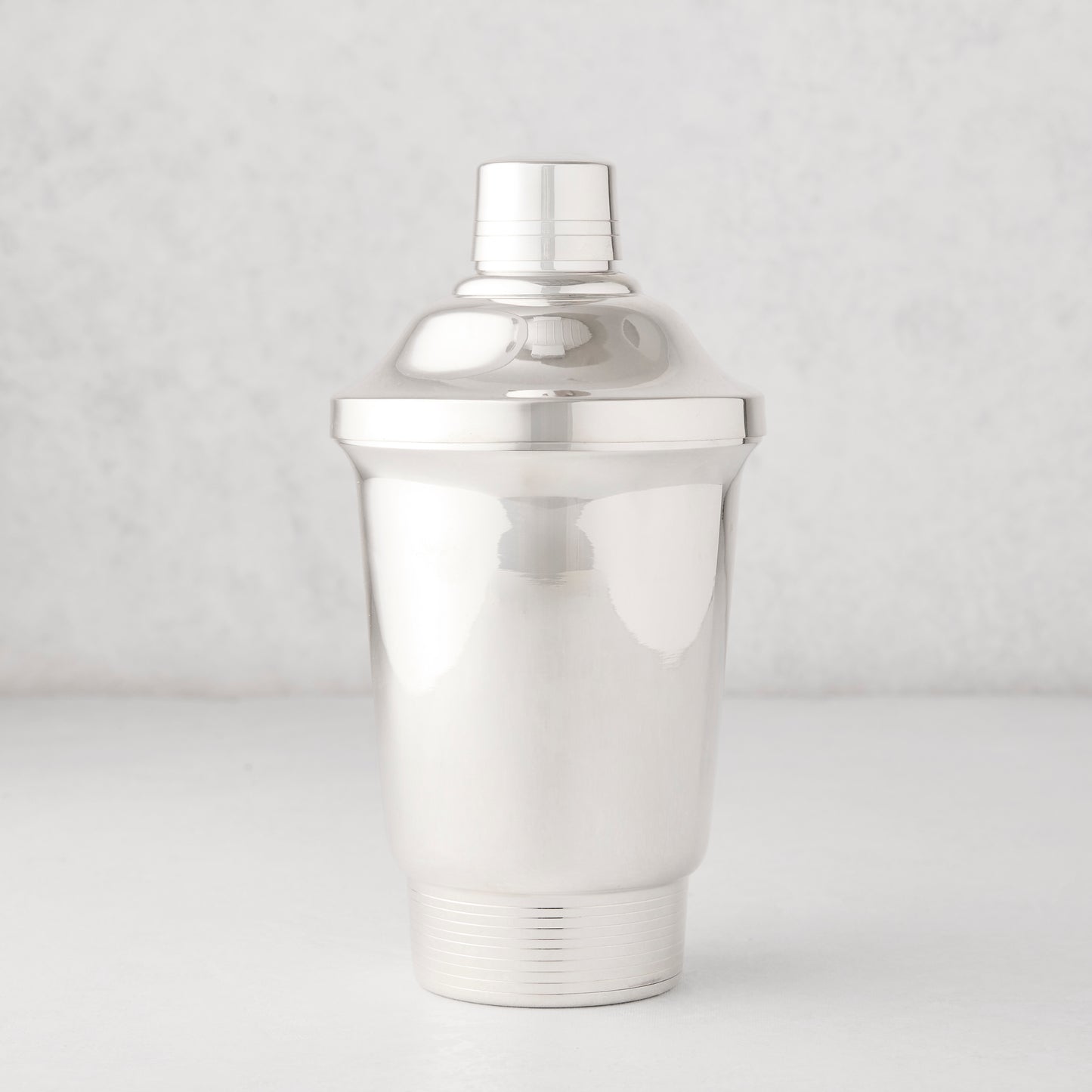 Vintage silverplate Maeve cocktail shaker with a polished finish.