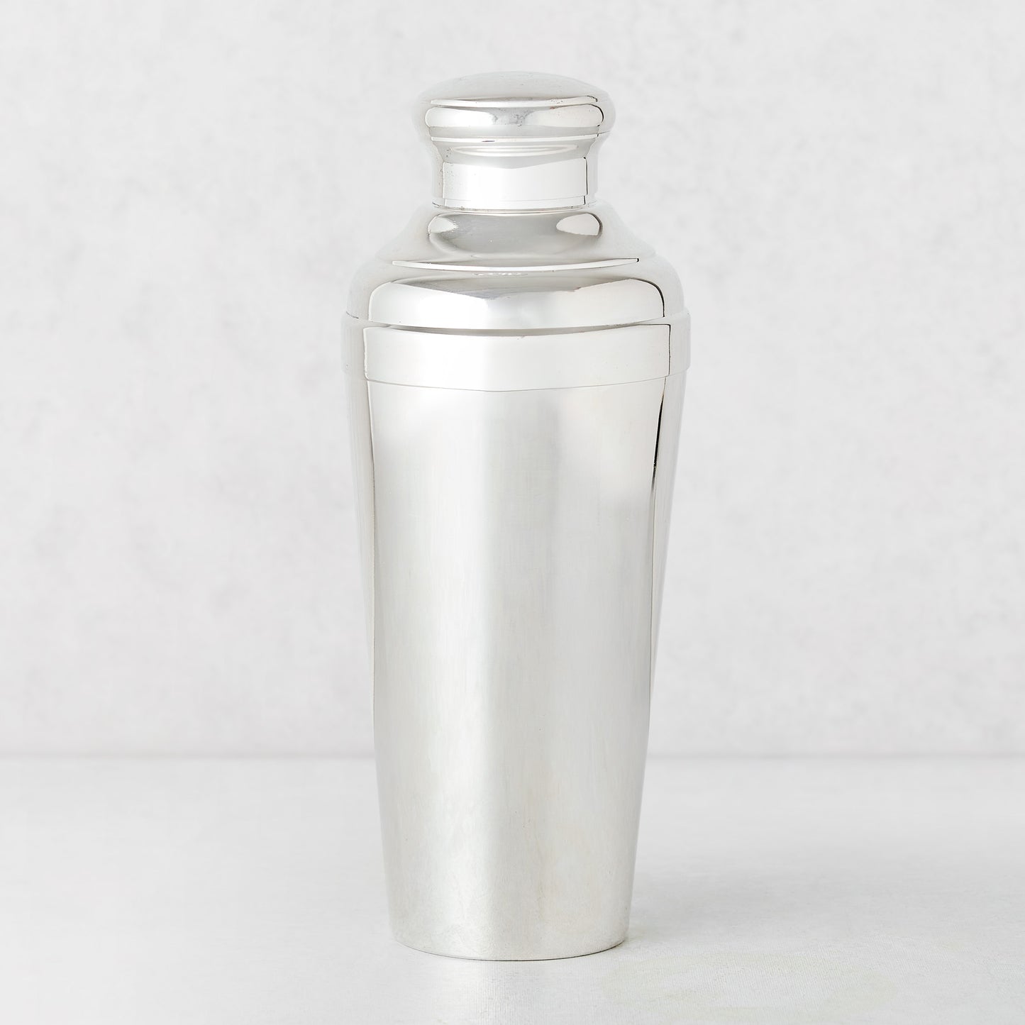 Vintage silverplate tall Reece cocktail shaker with a polished finish.