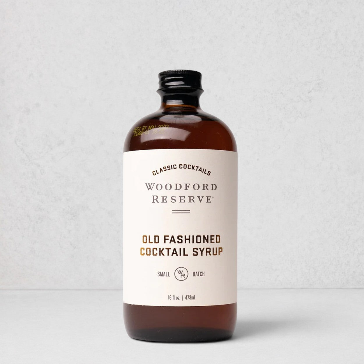 Woodford Reserve Old Fashioned Cocktail Syrup in a 16oz amber glass bottle with a white label.