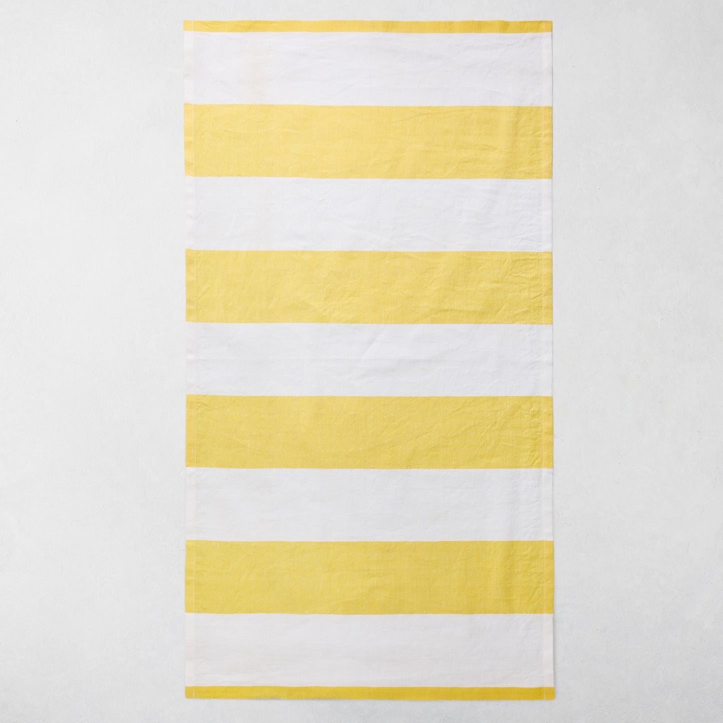 Yellow and white striped cotton-linen hand towel, 20"W x 30"L.
