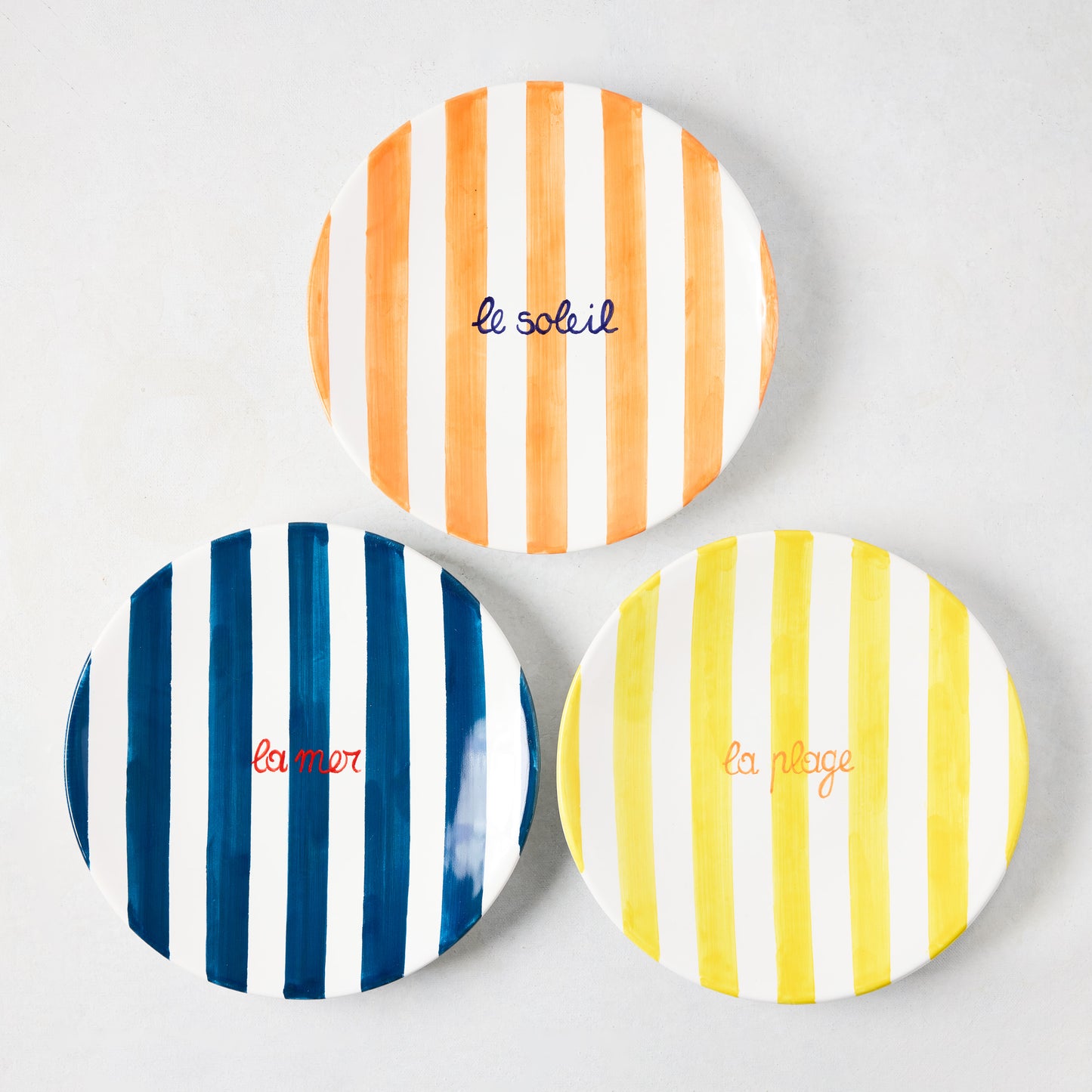 Yellow Stripe "La Plage" ceramic appetizer plate with hand-painted stripes and text, 7.85" Dia.
