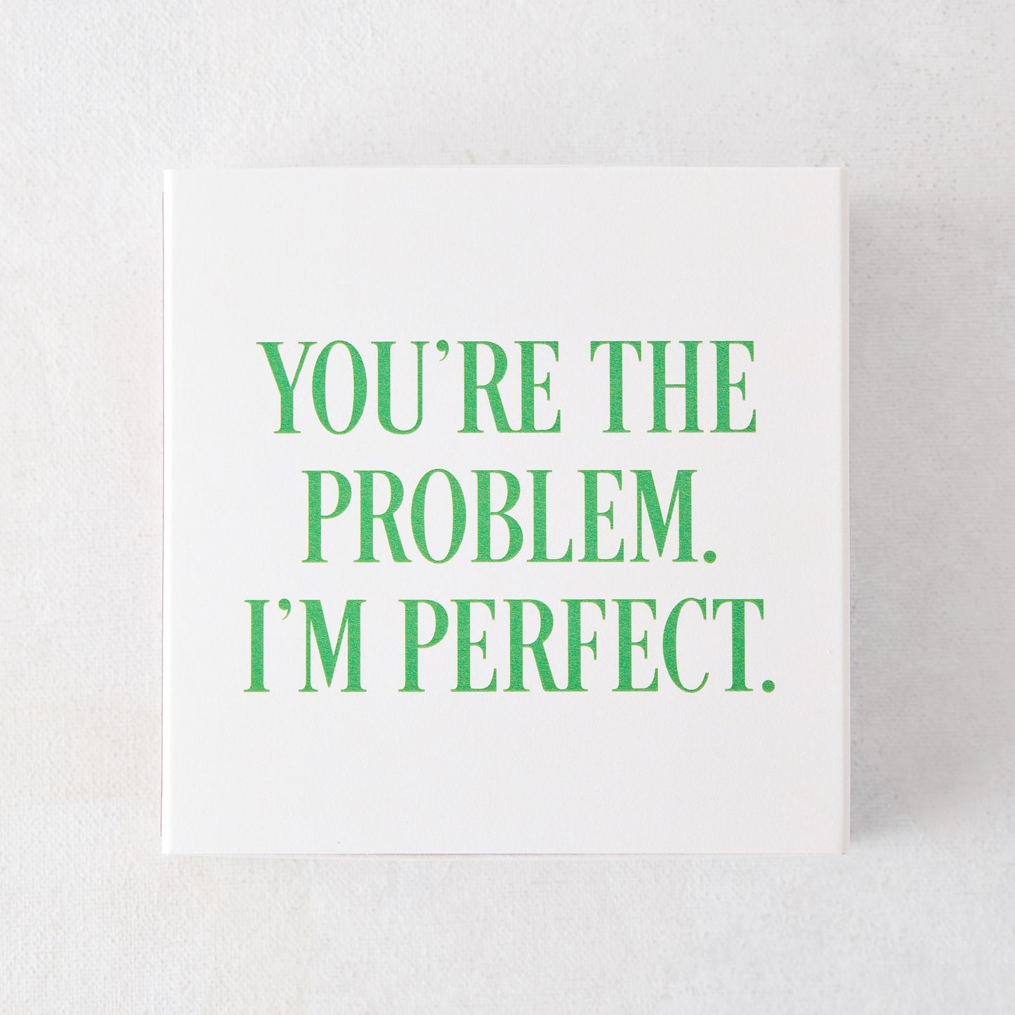 White box of "You're the Problem. I'm Perfect." oversized matches with green text.