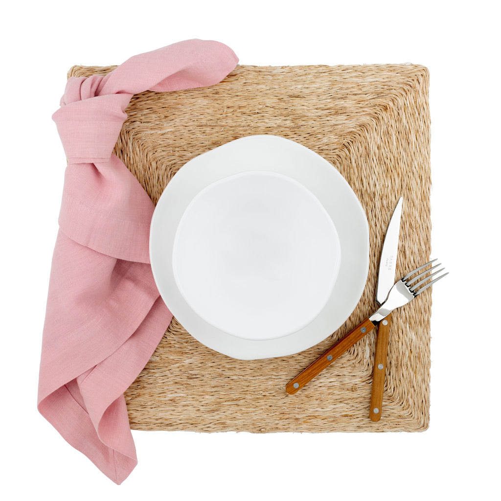 square woven placemat with rose pink napkin