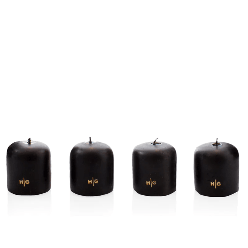 Set of 4 HG Black Unscented 2" Votive Candles, hand-dipped paraffin with gold HG logo.