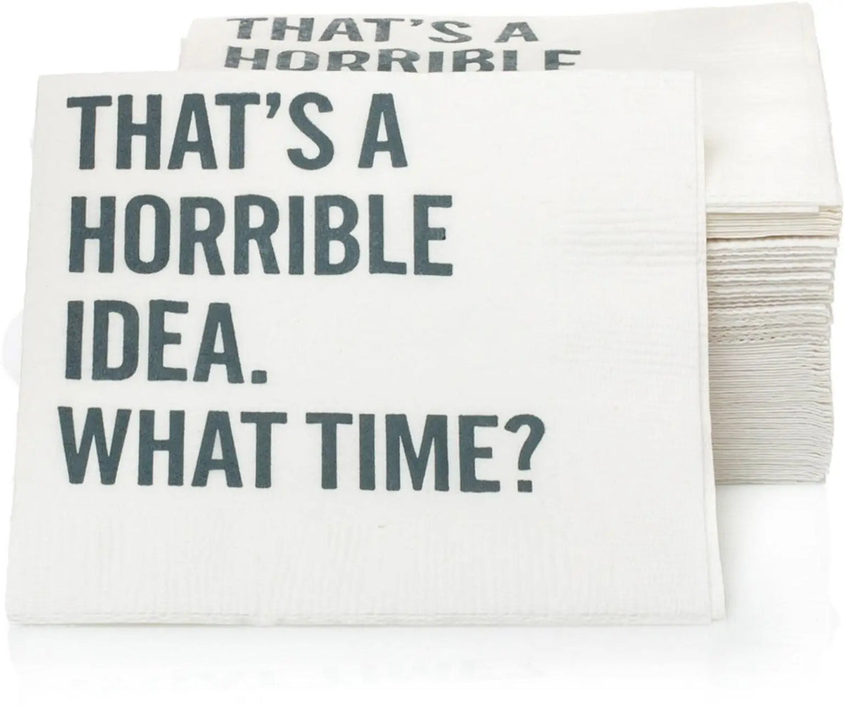 White paper cocktail napkins with "THAT'S A HORRIBLE IDEA. WHAT TIME?" in grey sans-serif font.