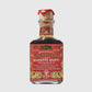 Hudson Grace Giuseppe Giusti 3 Gold Medals balsamic vinegar in a glass bottle with a red wax-sealed cork stopper.