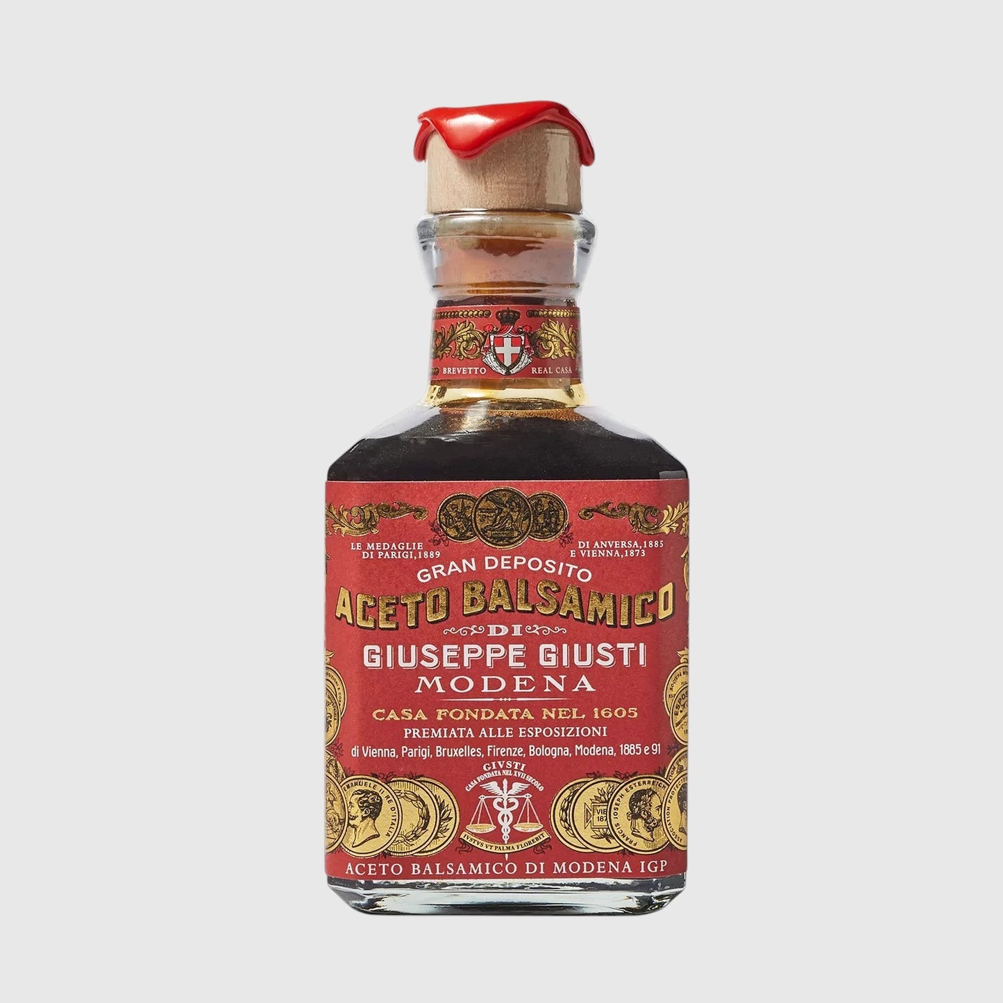 Hudson Grace Giuseppe Giusti 3 Gold Medals balsamic vinegar in a glass bottle with a red wax-sealed cork stopper.