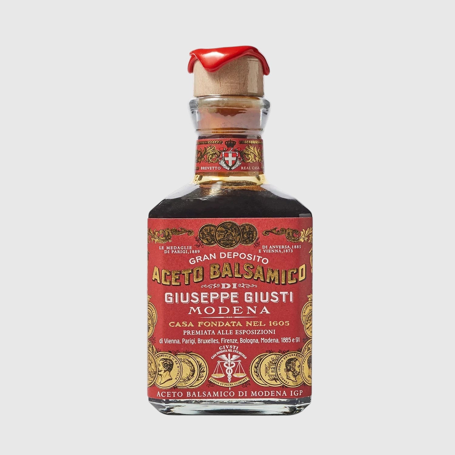 Hudson Grace Giuseppe Giusti 3 Gold Medals balsamic vinegar in a glass bottle with a red wax-sealed cork stopper.