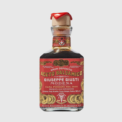 Hudson Grace Giuseppe Giusti 3 Gold Medals balsamic vinegar in a glass bottle with a red wax-sealed cork stopper.