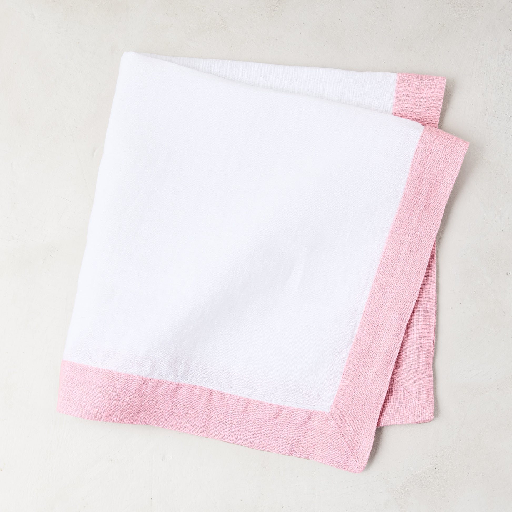 linen napkin with pink border