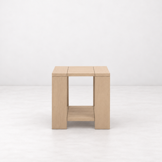 Square teak wood outdoor end table with a lower storage shelf in a light washed finish against a white background.