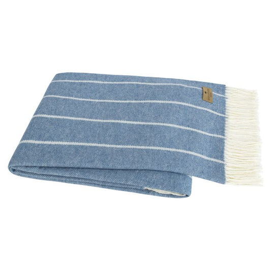 Blue and white striped blanket with a brand tag on a white background