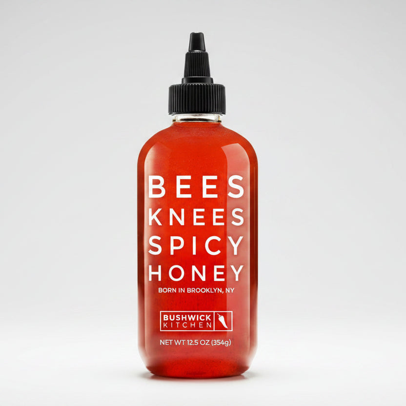 Bottle of Bees Knees Spicy Honey from Bushwick Kitchen on a white background