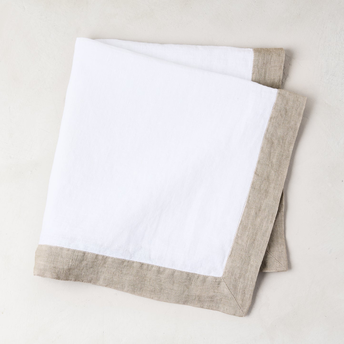 khaki border linen napkin white
