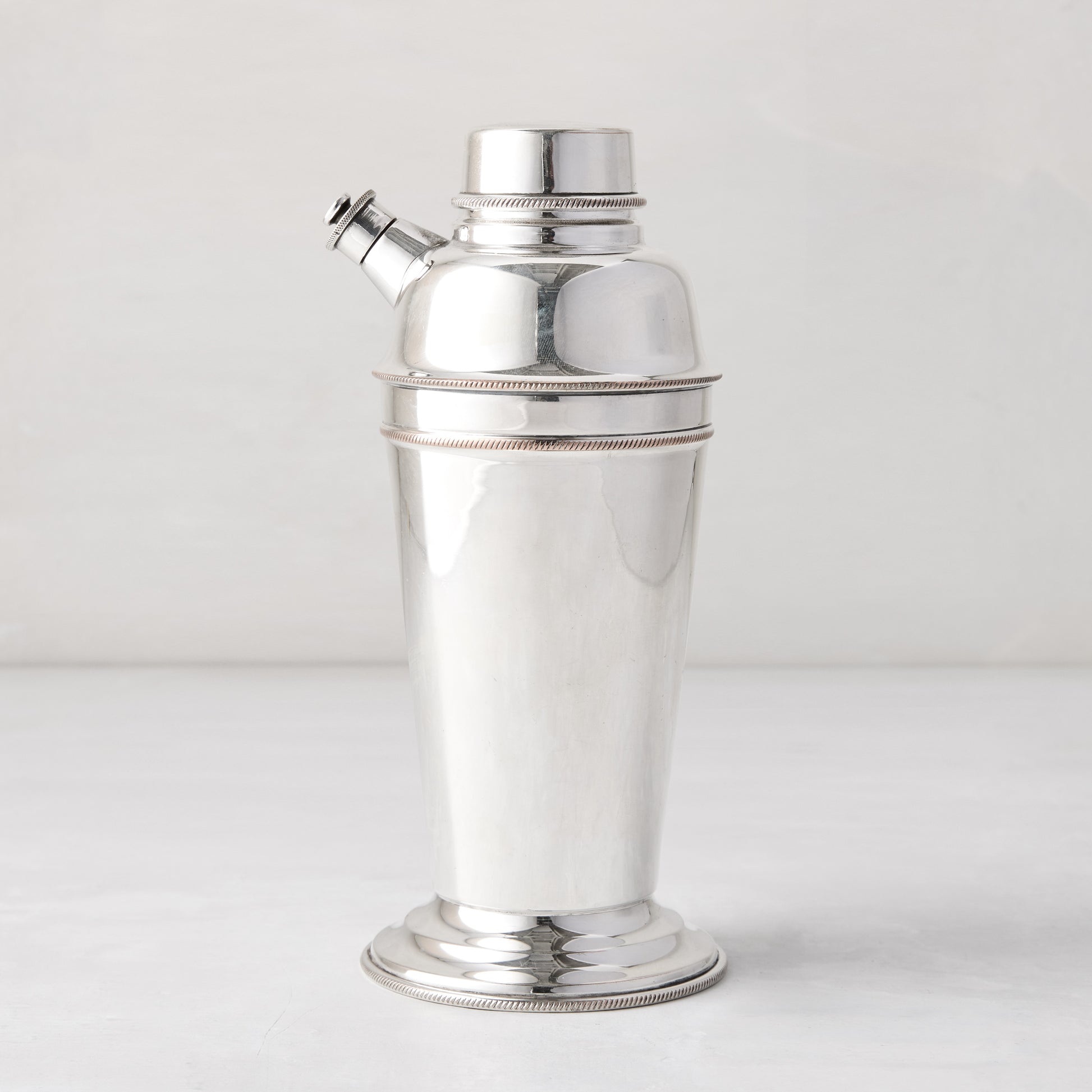 vintage silverplate cocktail shaker with spout and base