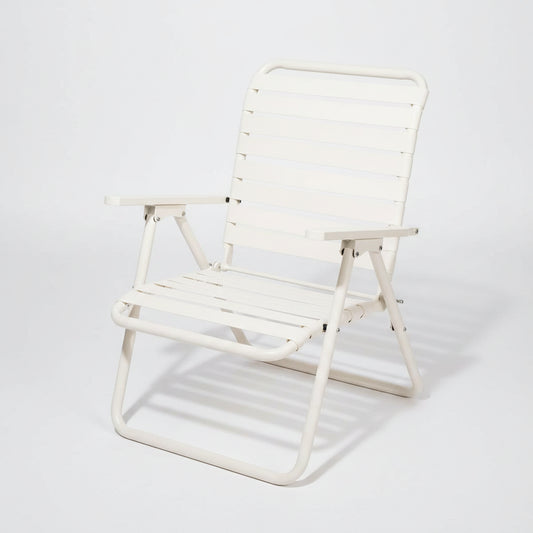 White folding chair on a white background