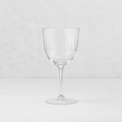 Harrington lead-free crystal red wine glass with a hand-cut oval pattern on a thin, elegant stem.