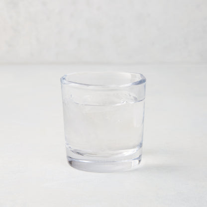 Abraham Scissor-Cut Glass Tumbler, 6 oz., clear, thick air-blown glass with rippled rim.